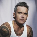 Gigant metalu w nowym singlu i klipie Robbiego Williamsa